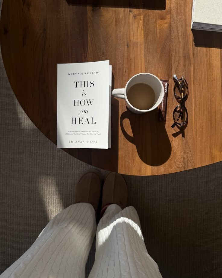 A calm home-kitchen morning moment with a Snickerdoodle latte in hand